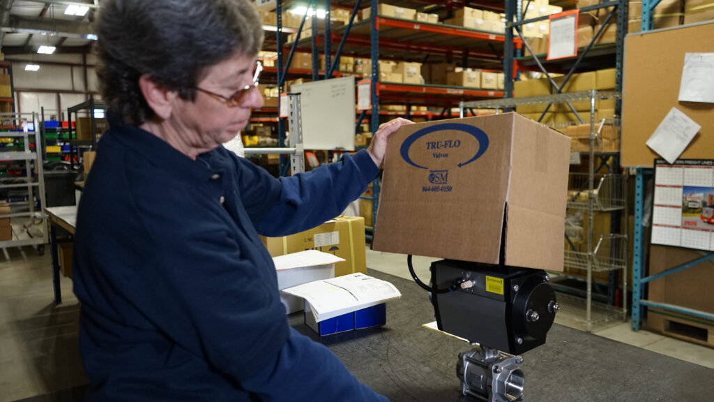 Packaging automated valve assembly for shipment in warehouse fulfillment environment