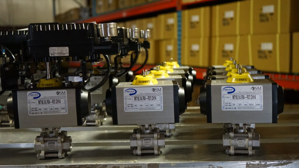 Automated stainless steel ball valves with pneumatic actuators assembled for industrial flow control systems
